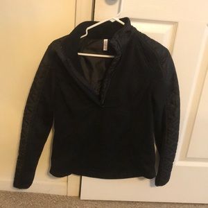 Black half zip pull over